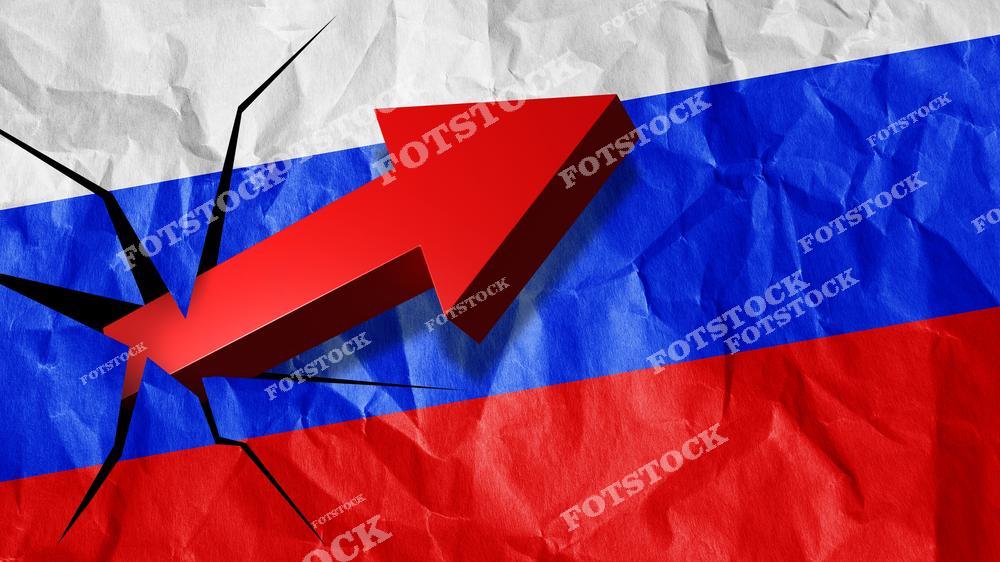 На изображении красная стрелка, пробивающая поверхность российского флага с эффектом трещин. Композиция символизирует экономические изменения, давление или движение вперед. Фото подходит для тем, связанных с ростом, кризисами или прорывами.