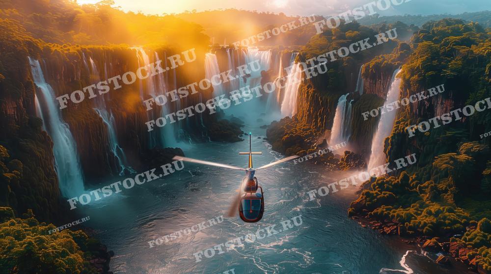 На фотографии изображен вертолет, летящий над величественными водопадами Игуасу на фоне закатного неба. Солнечные лучи пробиваются сквозь густую листву, освещая бурные потоки воды. Этот снимок подчеркивает красоту природы и захватывающий дух приключений.