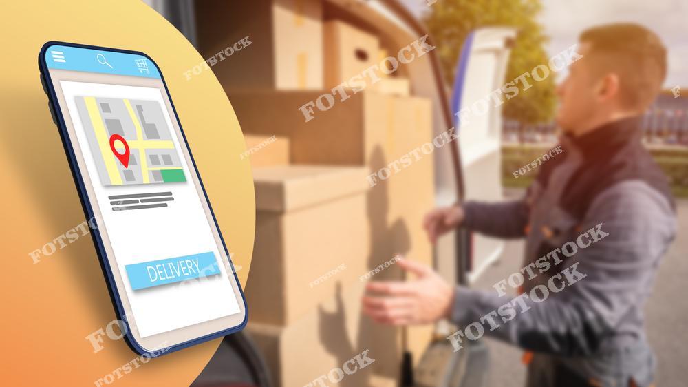 Смартфон с приложением отслеживания доставки отображает карту с местоположением заказа. На заднем плане курьер загружает коробки в грузовой фургон. Изображение символизирует автоматизацию логистики, современную систему доставки и мобильные технологии.